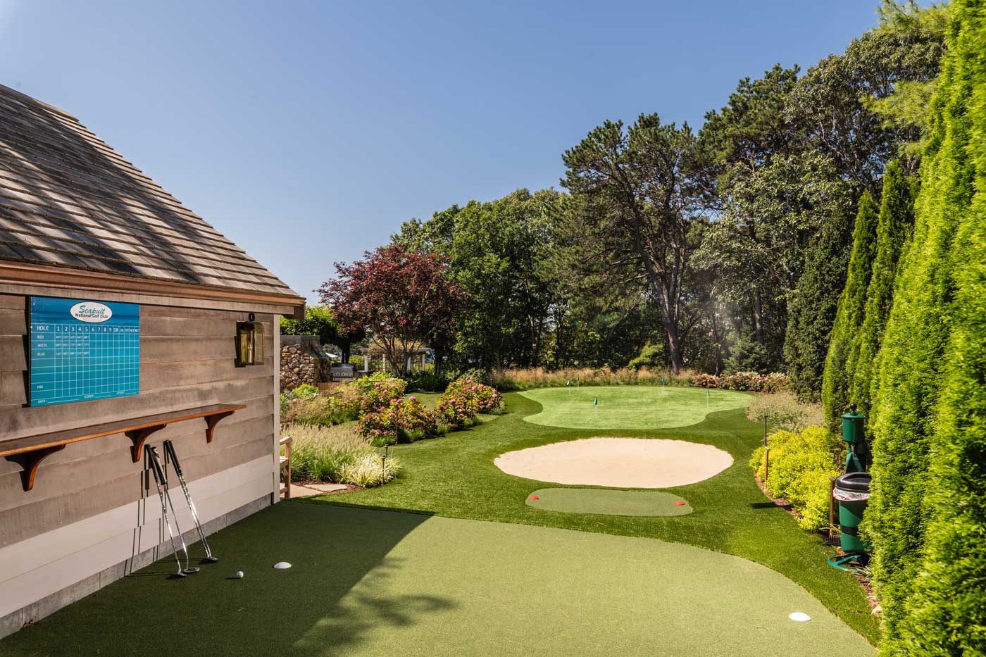 putting green next to a house