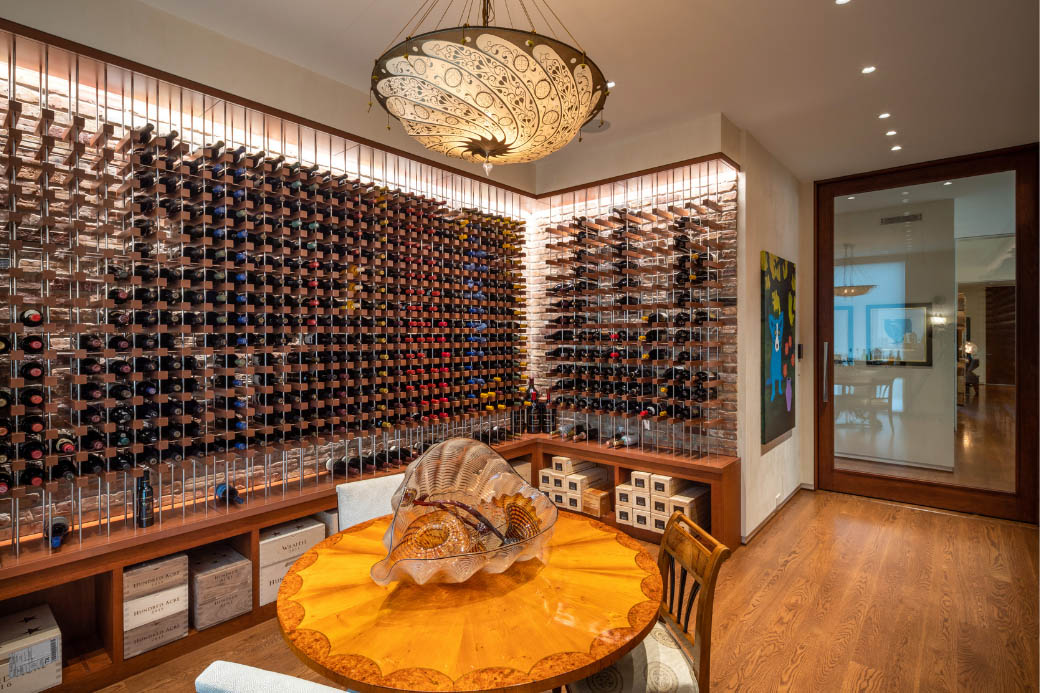 Brightly lit wine cellar with tasting table