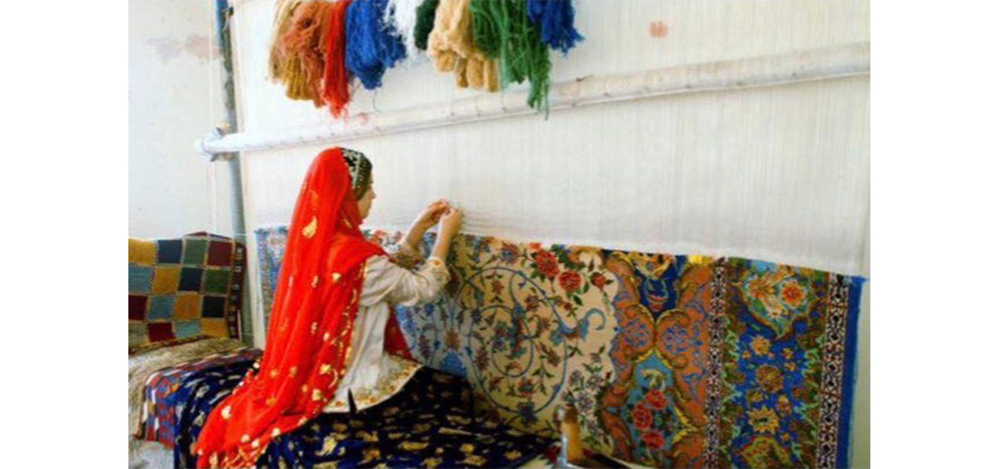 Hand making an Oriental rug