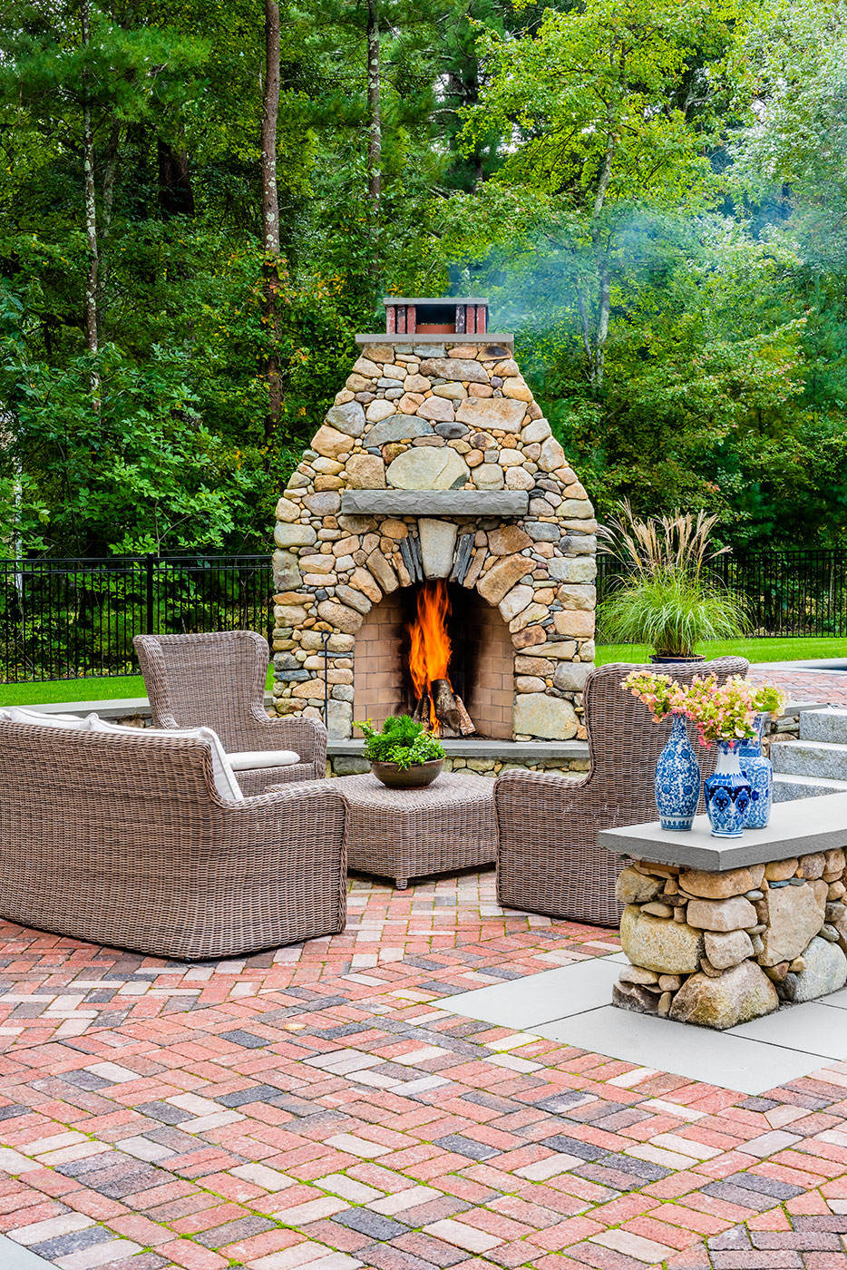 Fireplace terrace by BrickStone Design + Build