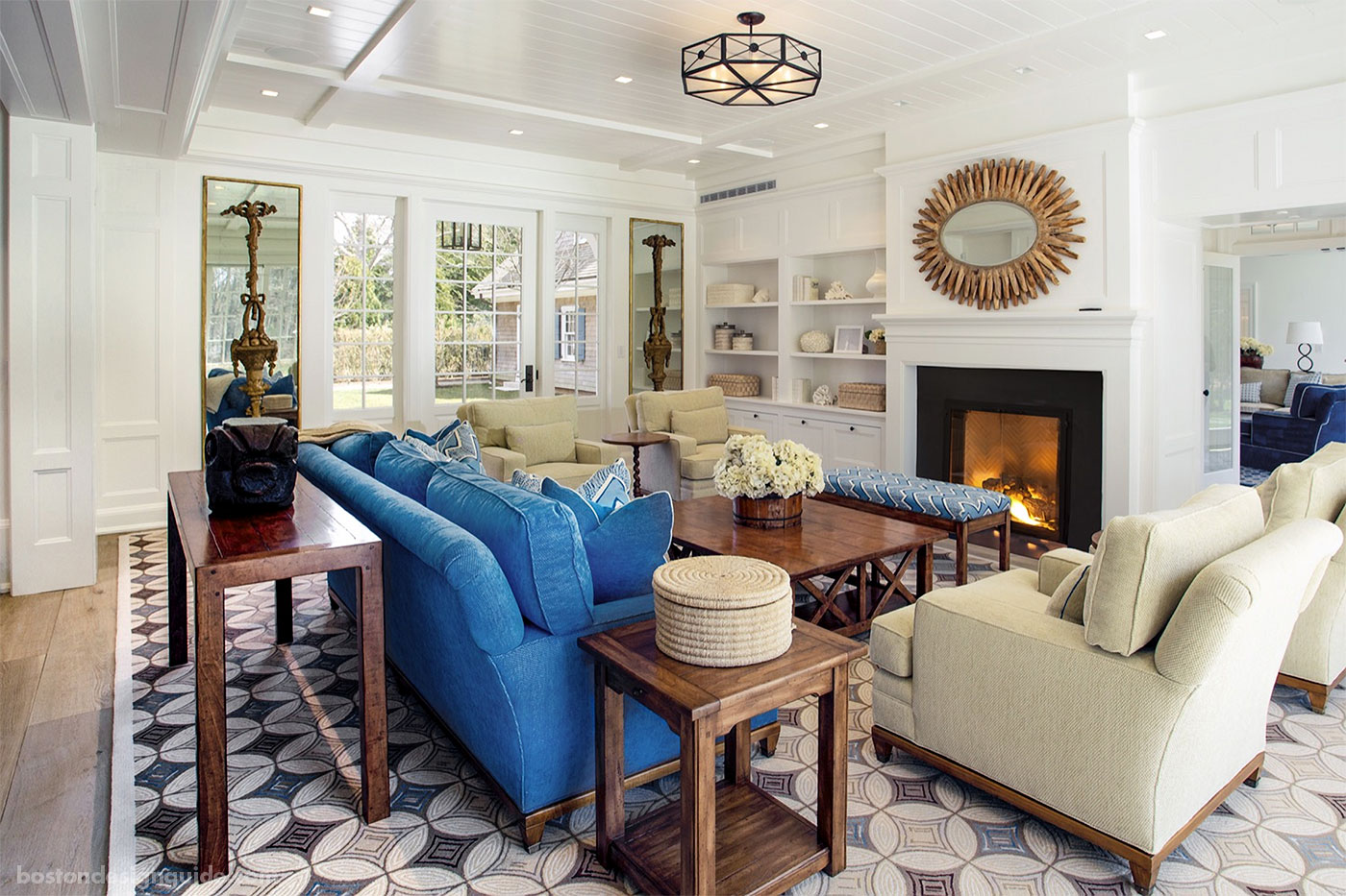 Shared living room of a conjoined Cape home designed to house two families