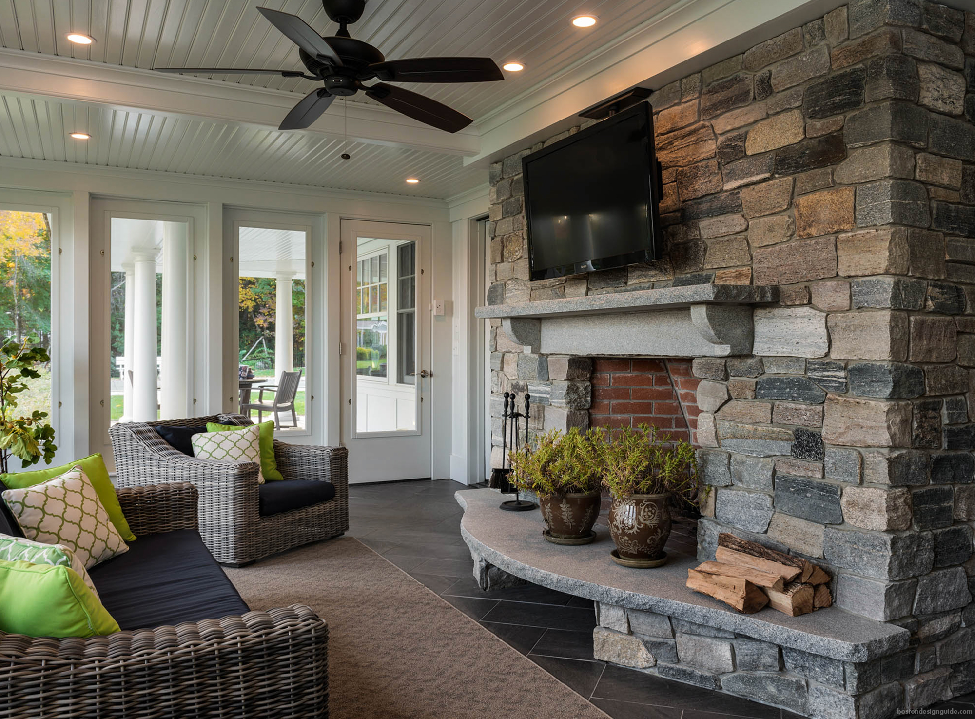 High-end screened porch with fireplace