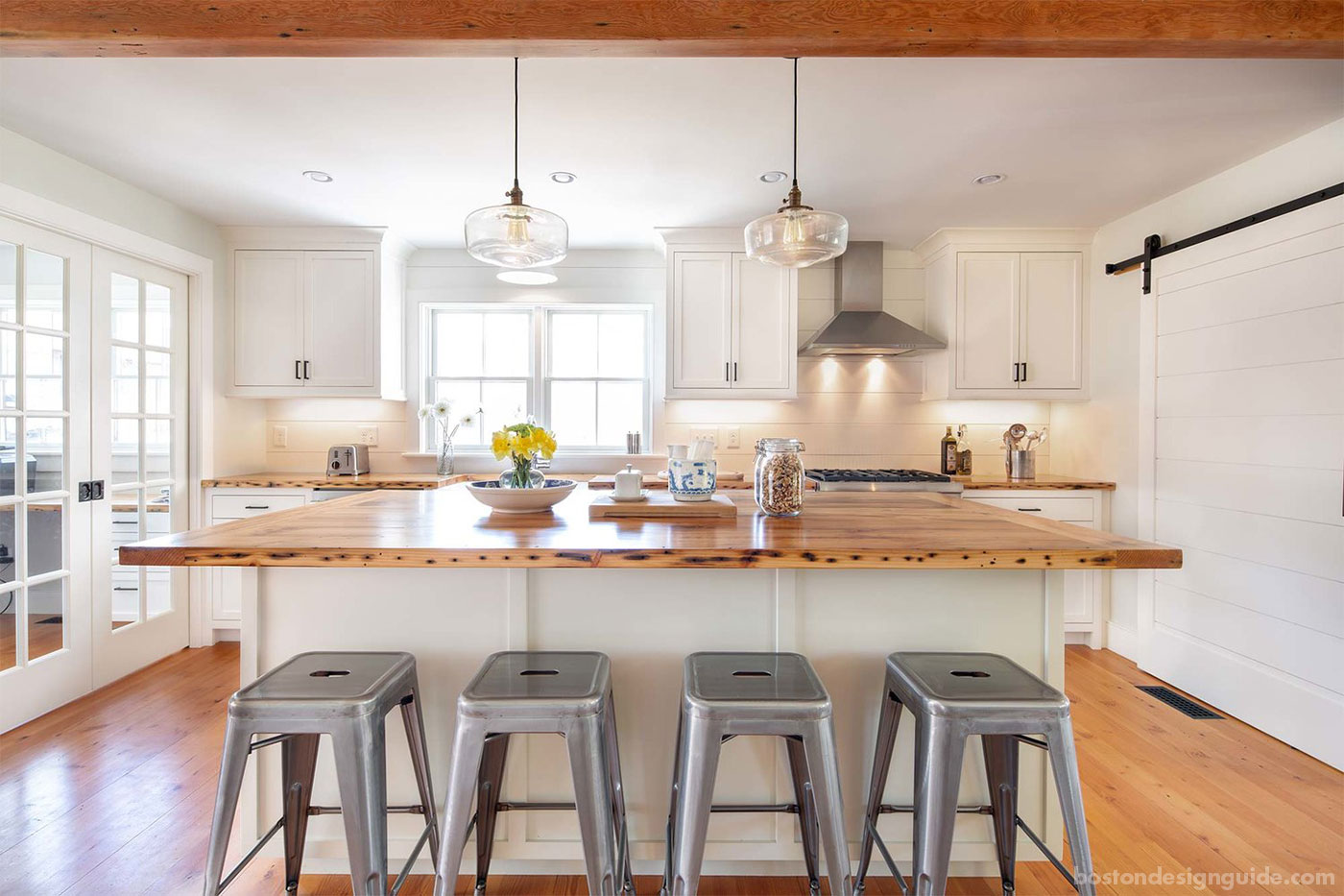 Farmhouse kitchen with nickel gap paneling by custom home builder Costello Fine Homes