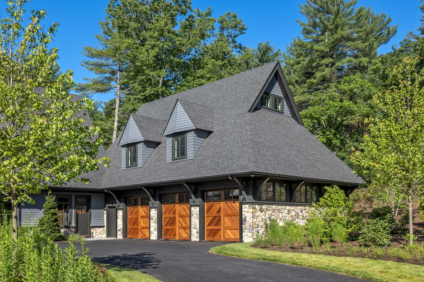 Shingle style home in rural wooded setting - Construction built 3 car garage / basketball court by Lynch Construction & Remodeling