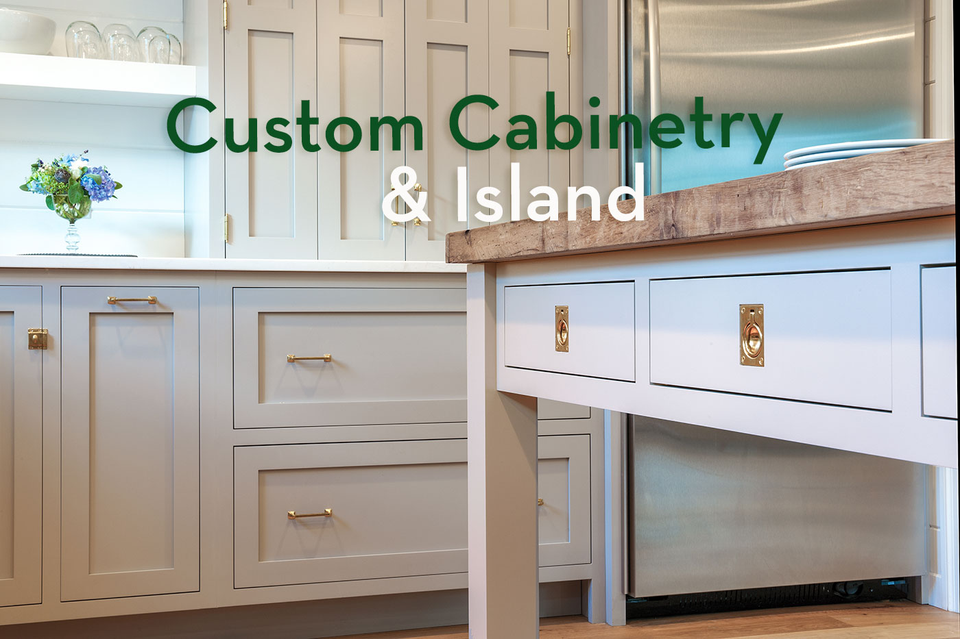 Custom cabinetry and island by Crown Point Cabinetry