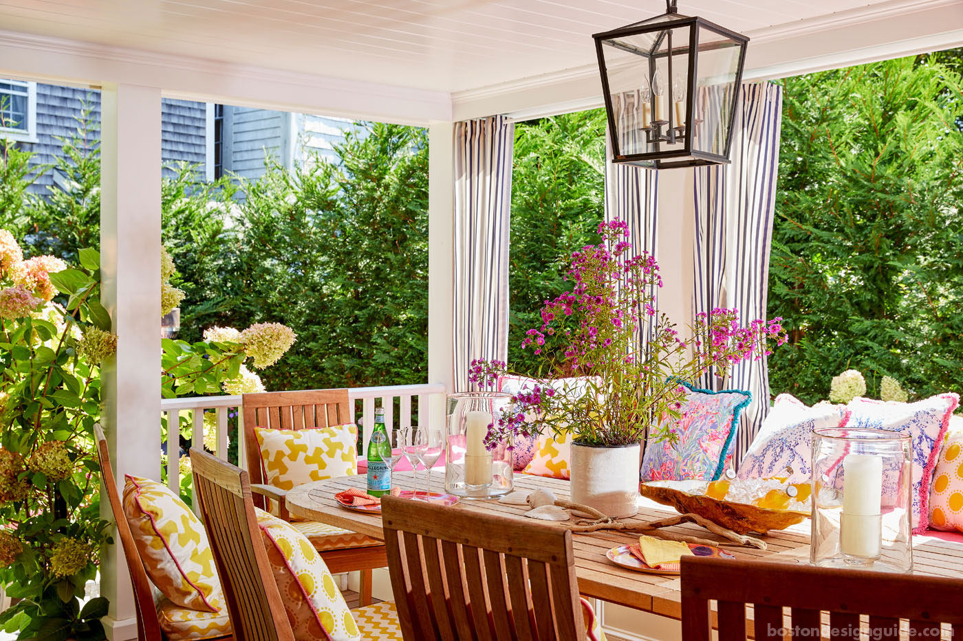 Coastal porch with curtains by Donna Elle Design