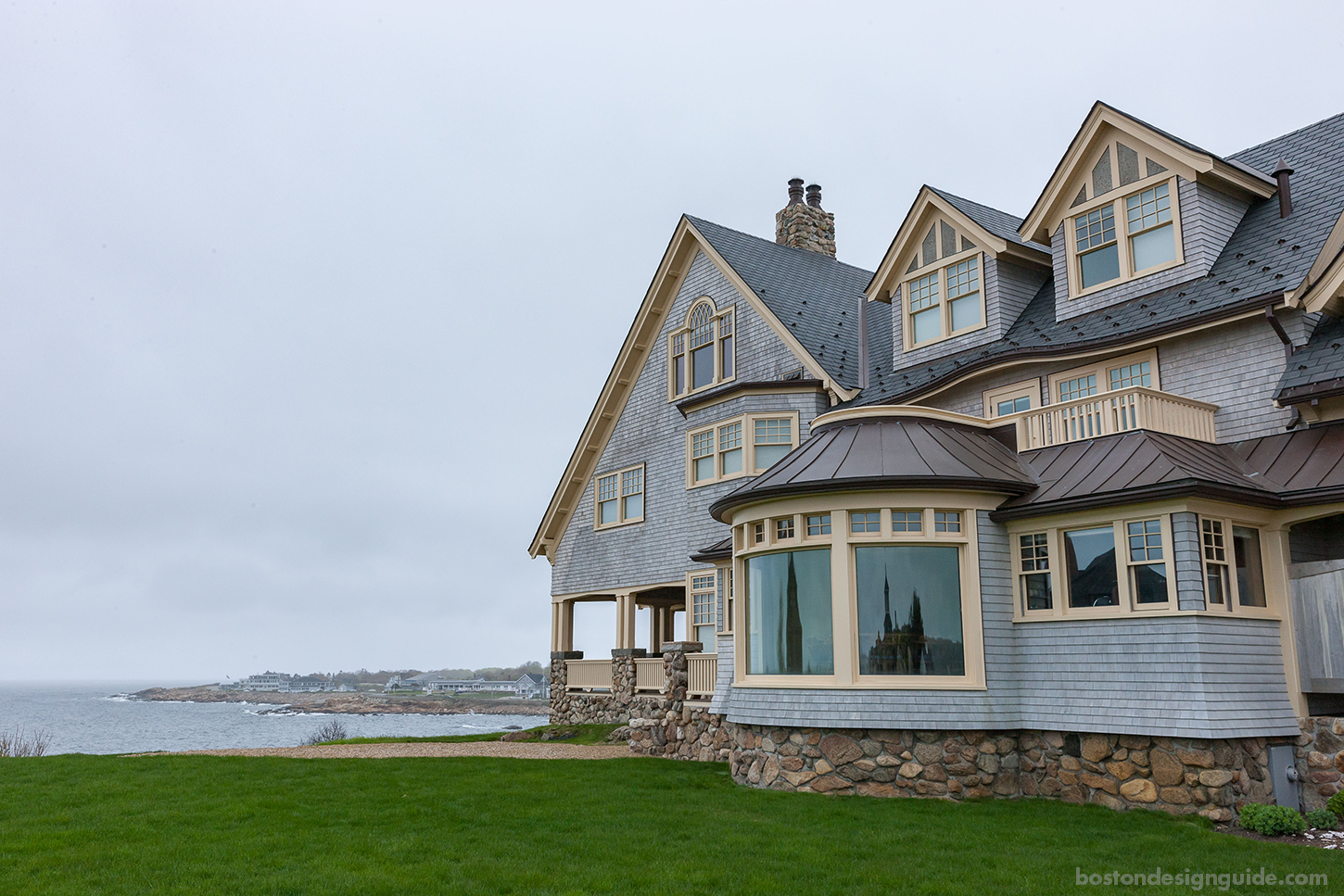 Shingle style Gloucester home with an antique pool table