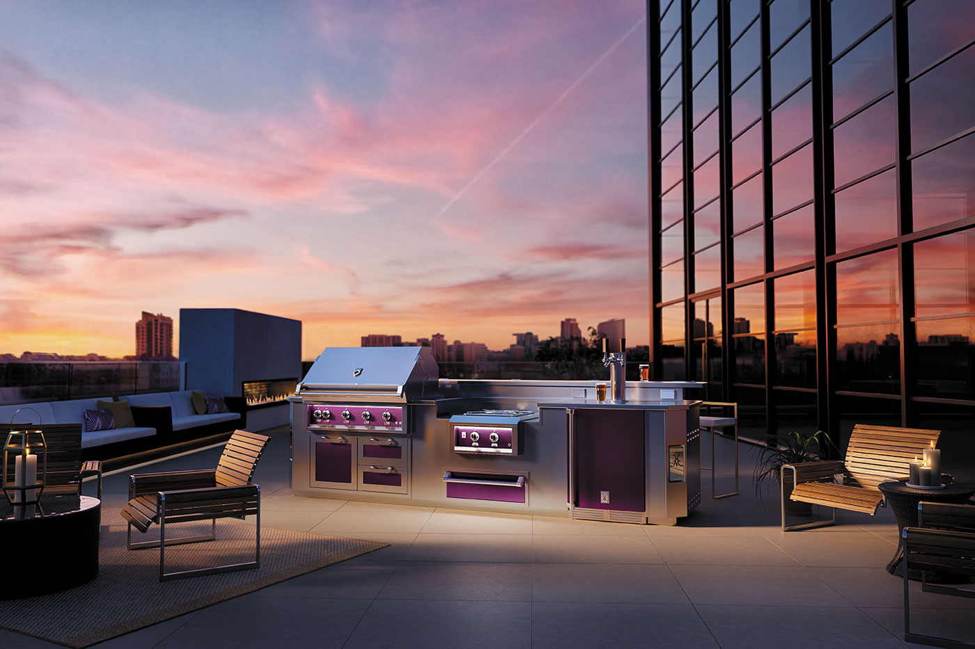 Rooftop outdoor kitchen set up with seating along the edge and fire burning in the fireplace