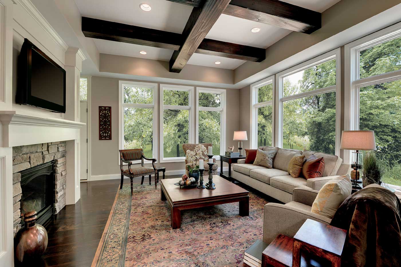 family room with large windows surrounding