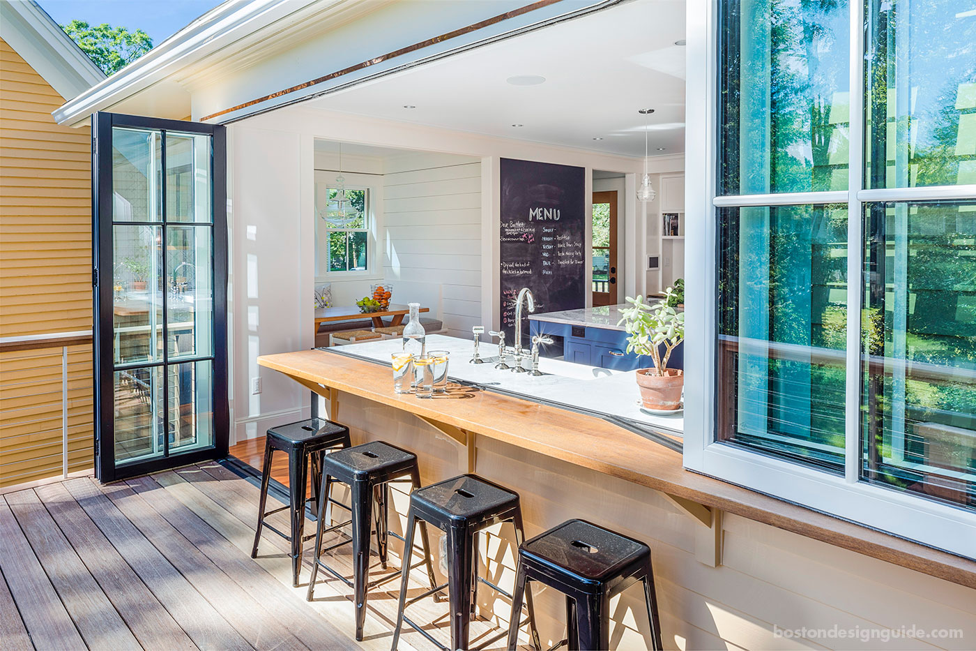 Indoor/outdoor kitchen by JW Construction