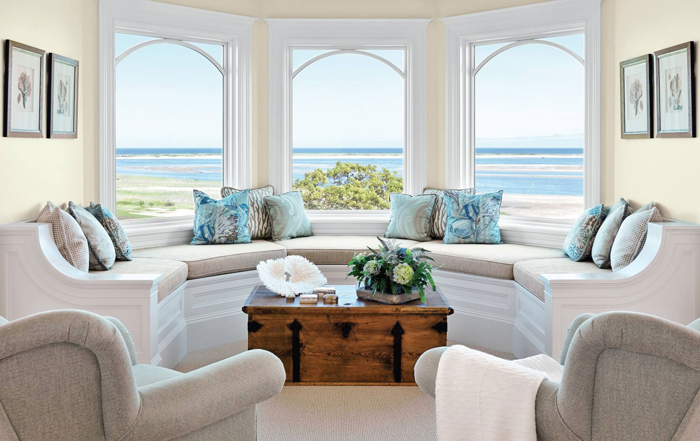 Built in window seat along bay window overlooking the water