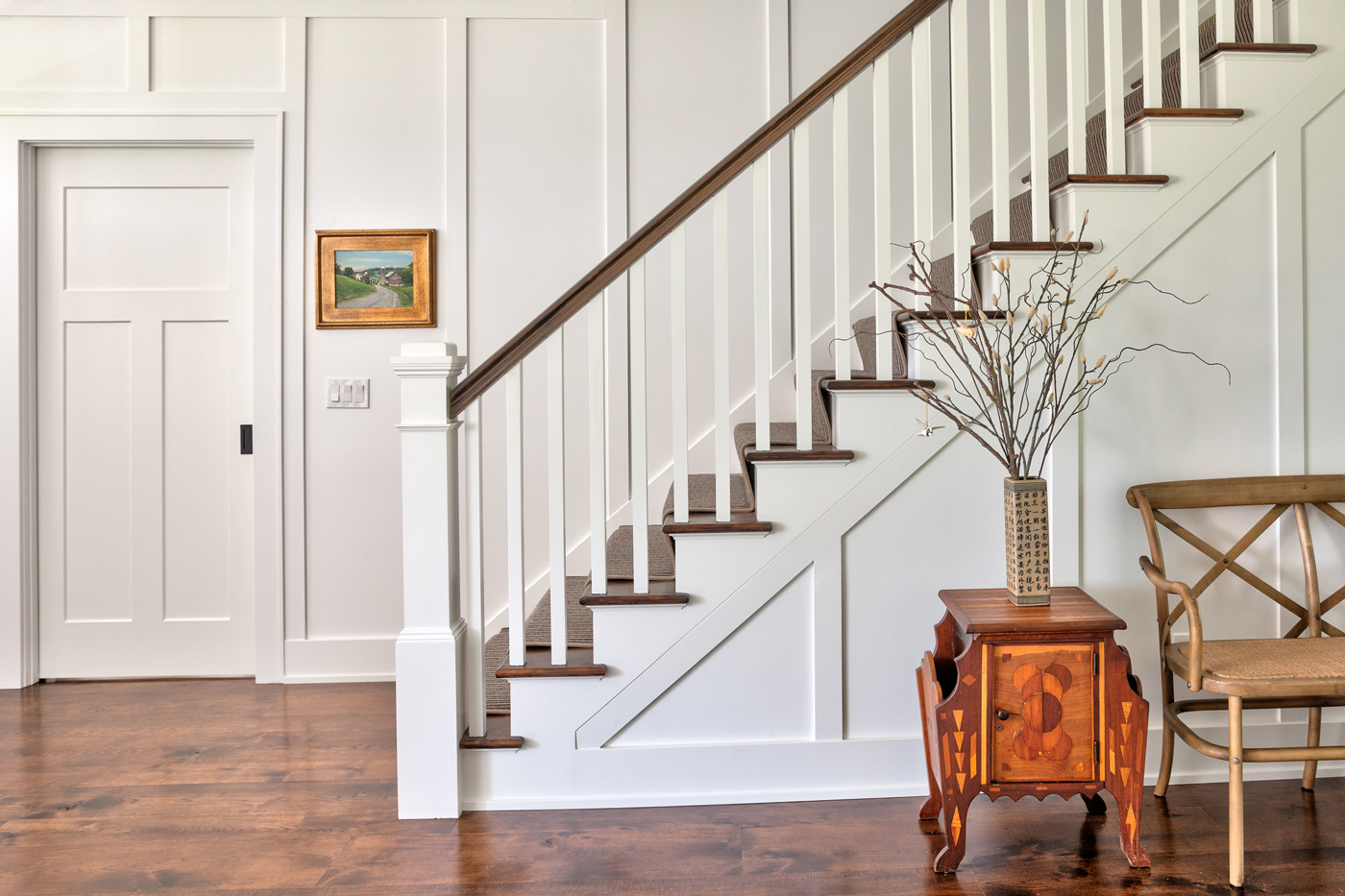 Staircase with custom wainscoting, Laplante Construction