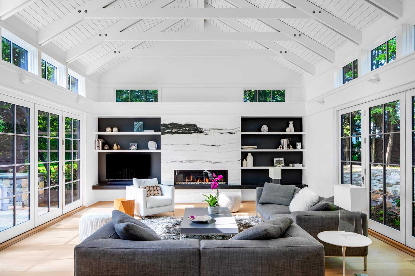family room with large windows surrounding