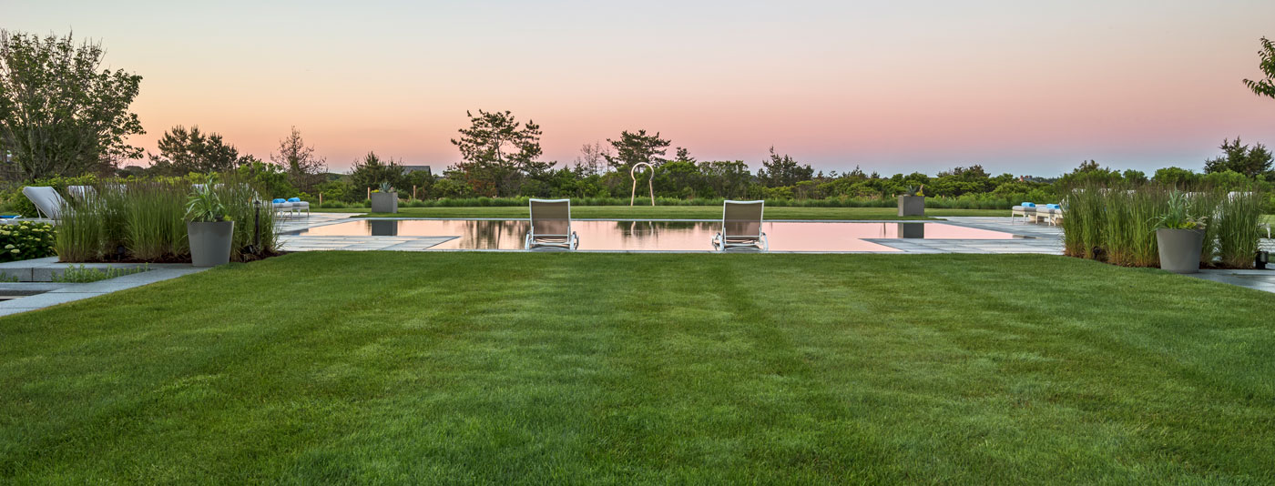 Custom coastal compound and pool terrace by landscape architect Gregory Lombardi Design