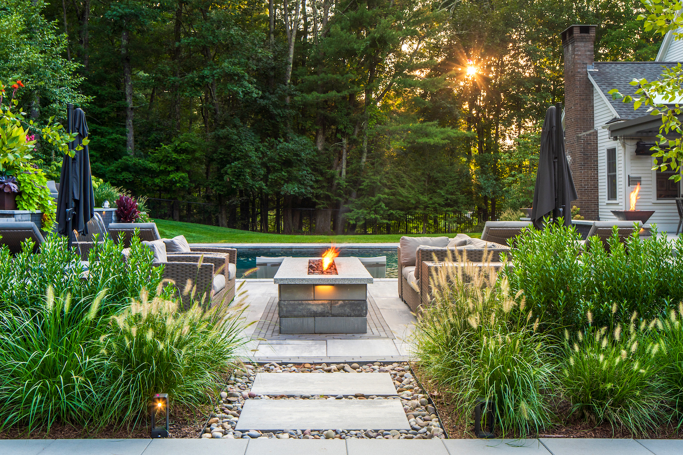 Outdoor seating area that overlooks the pool