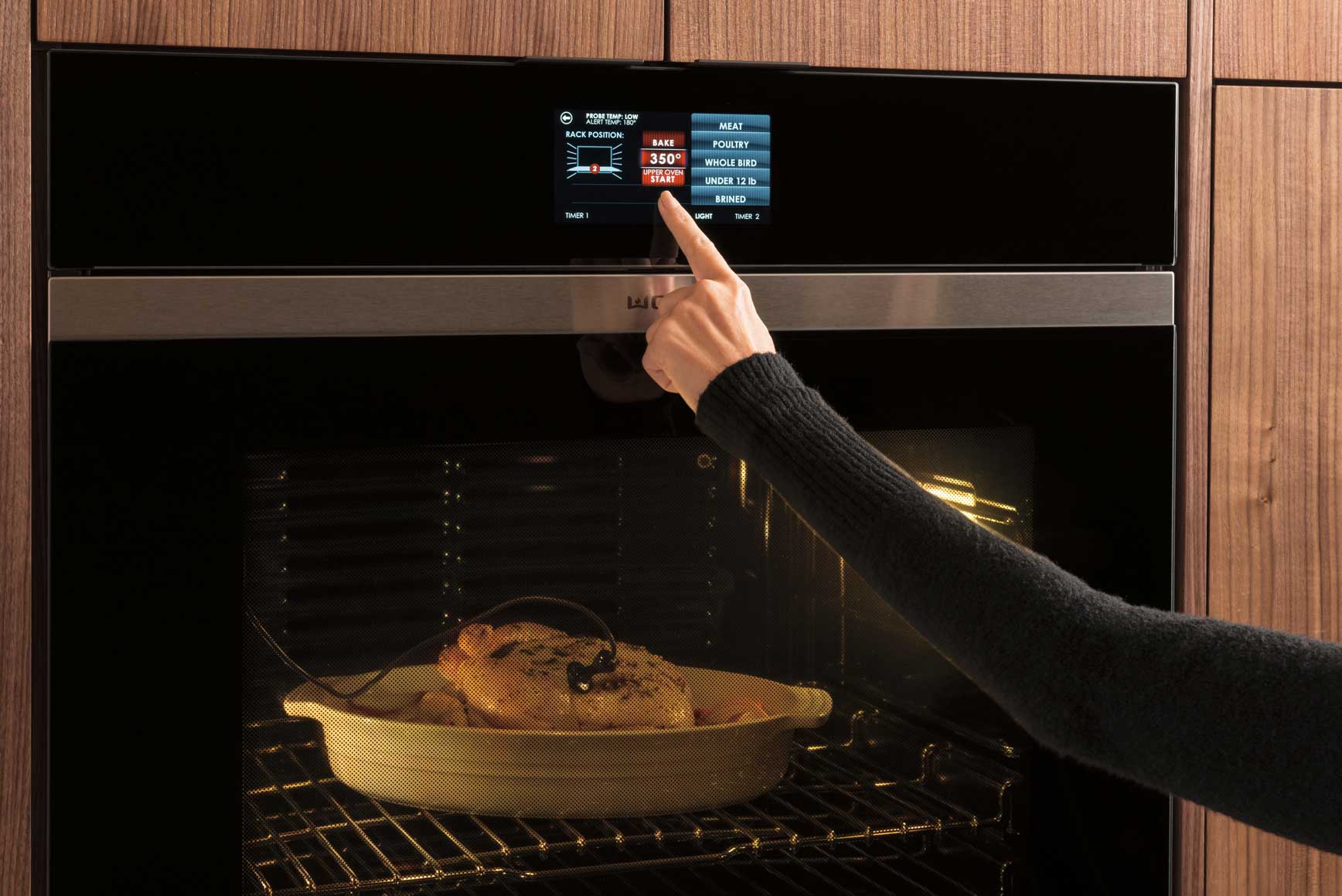 turkey being cooked in an oven