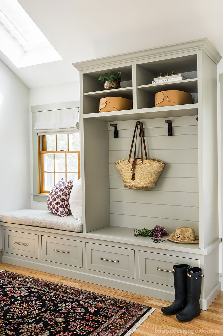 Renovated mudroom with nickel gap custom cabinetry by Mackenzie & Co.
