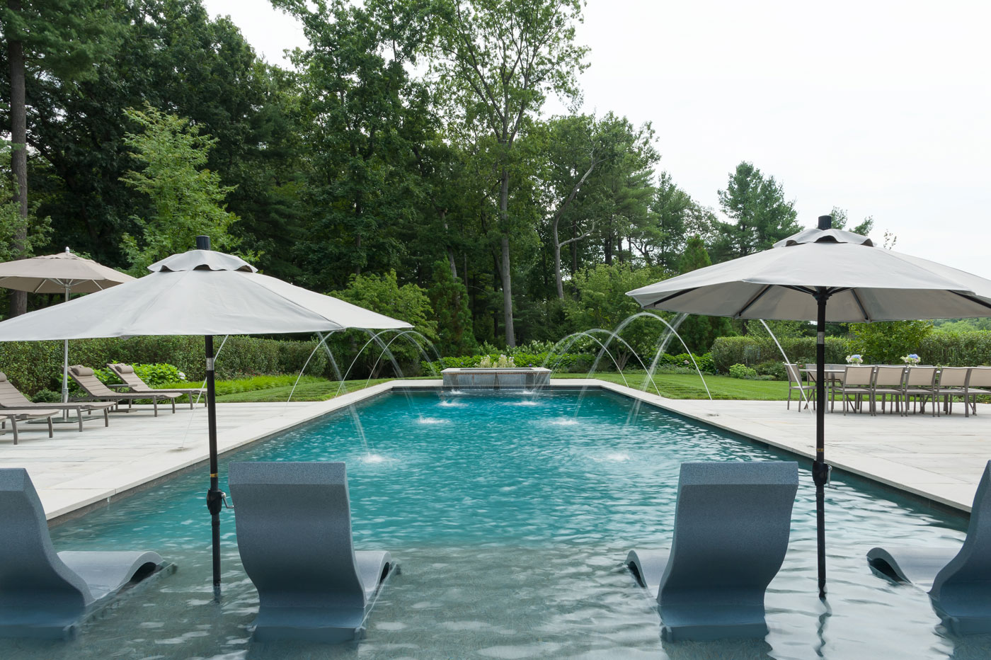 Custom pool terrace by high-end landscape professionals R.P. Marzilli