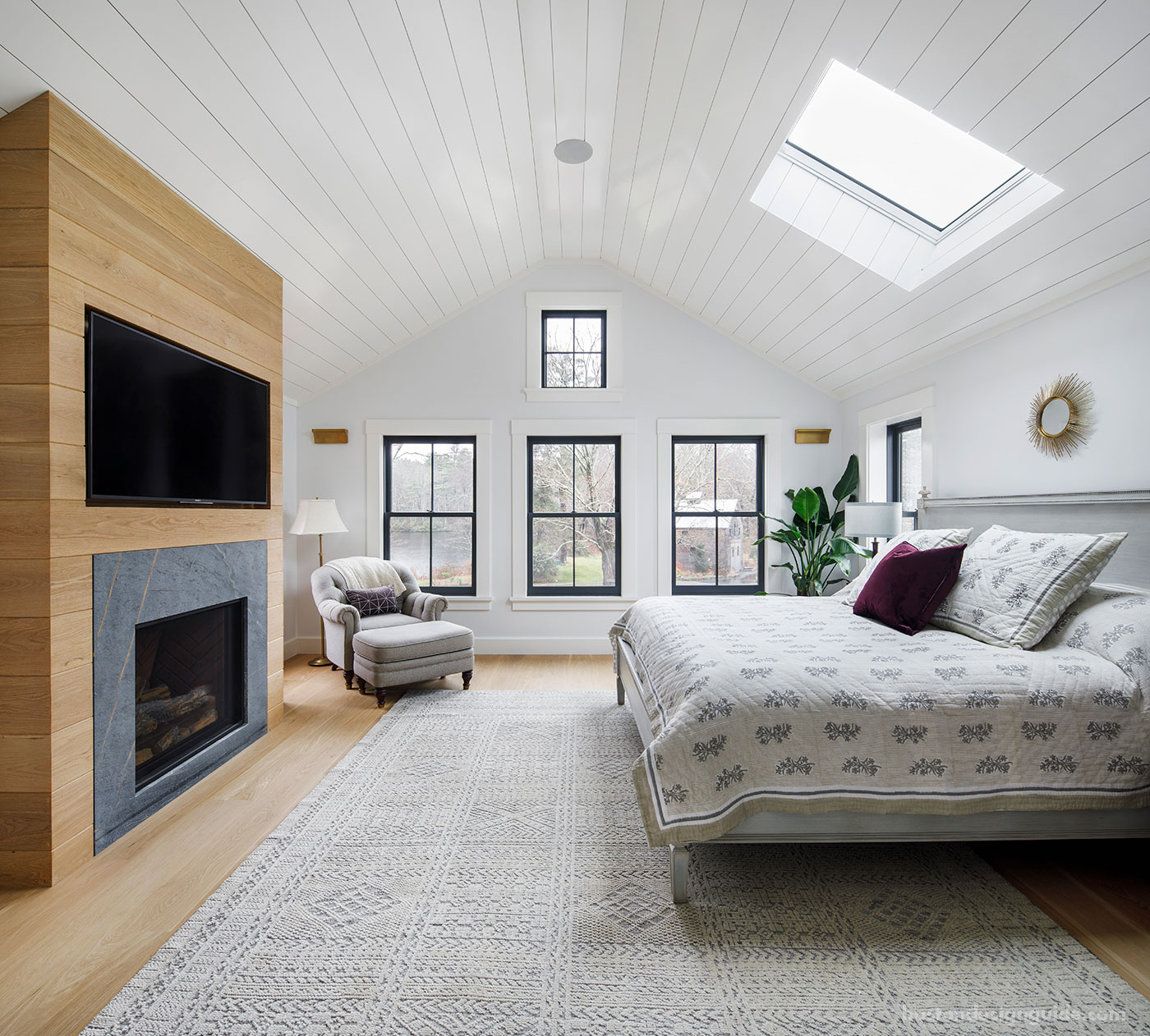 Master bedroom by custom home builder McCormack Buiilders with nickel gap wood paneling