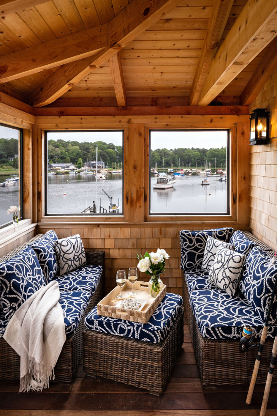 Porch of a Cape Cod boathouse built by McPhee and Associates