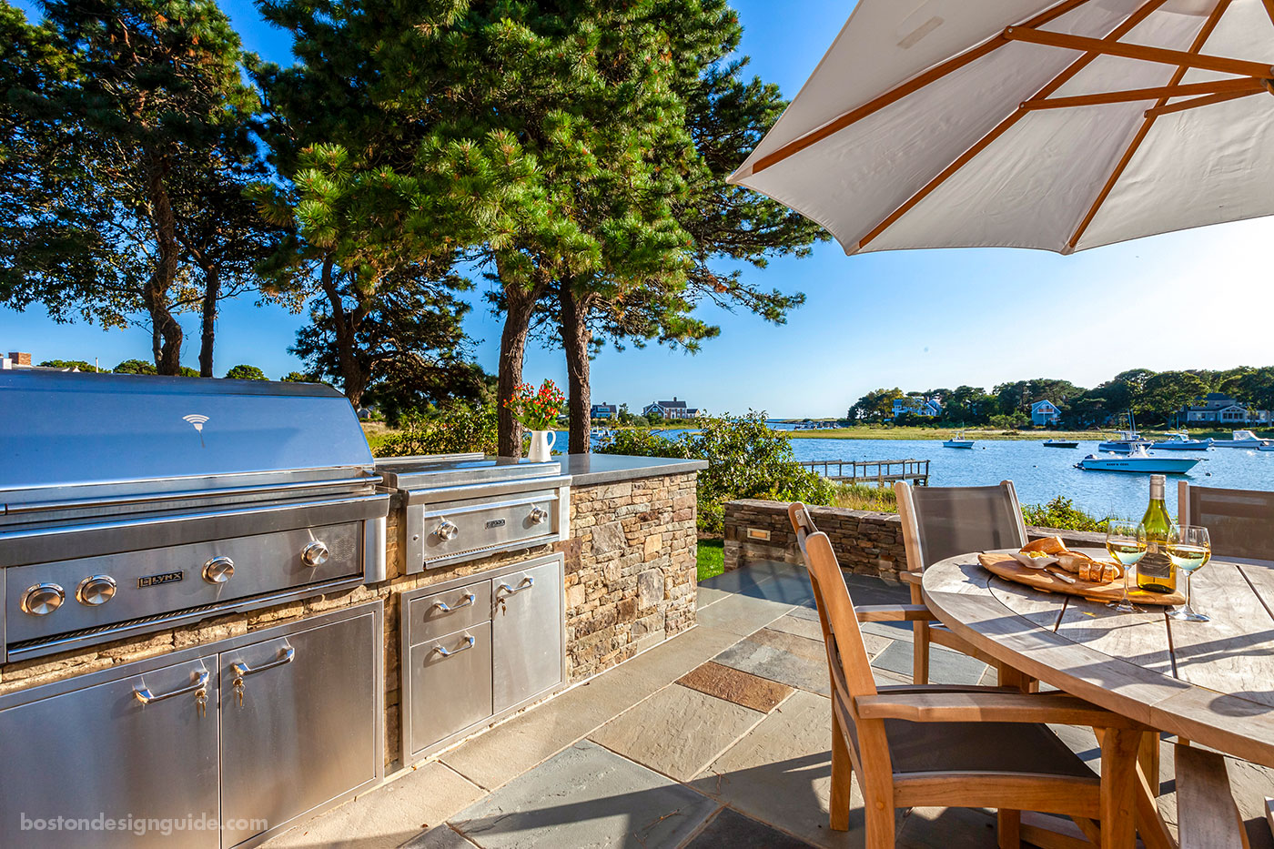 Outdoor kitchen and dining terrace by McPhee Associates of Cape Cod