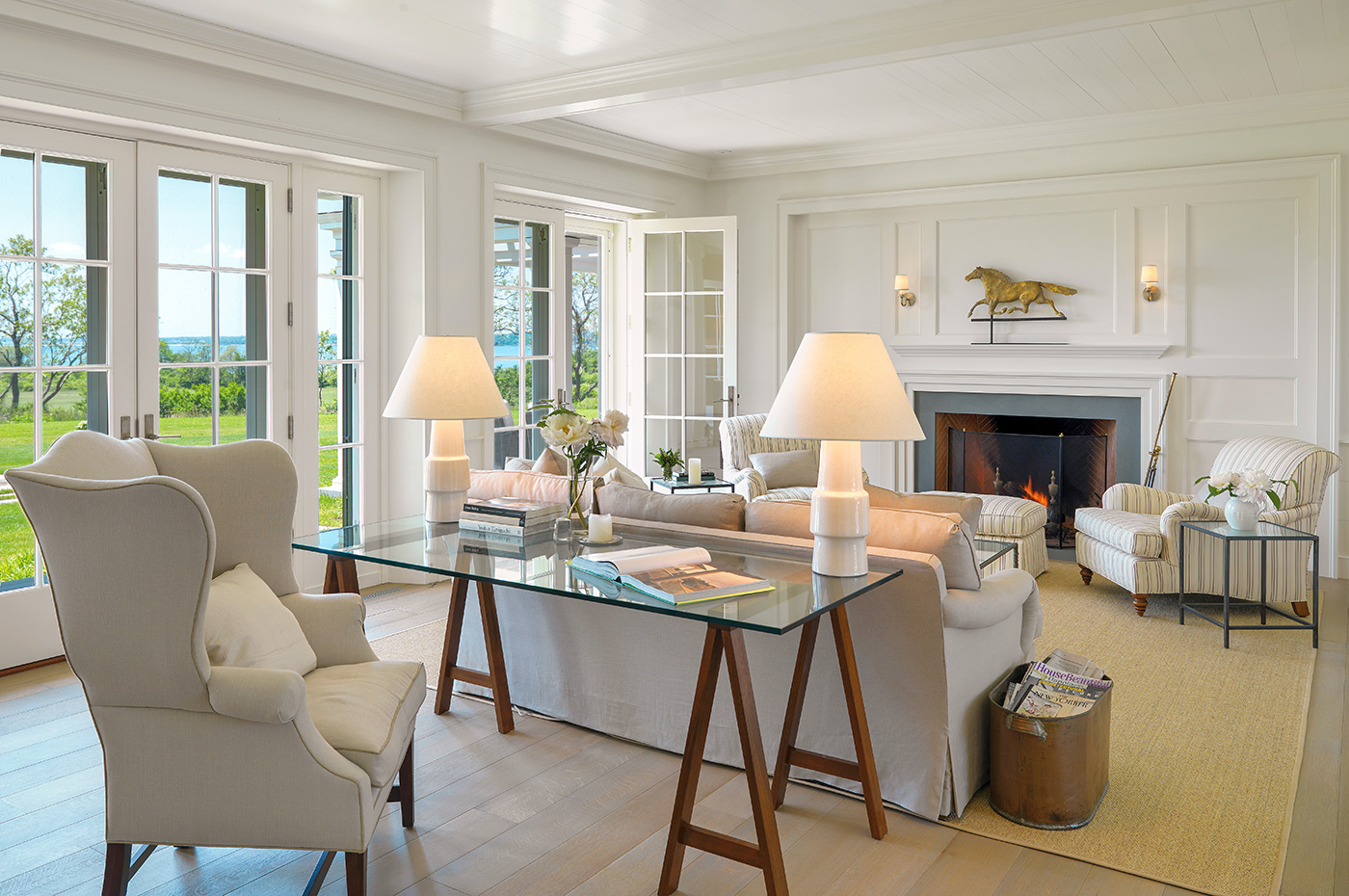 Work desk in a gracious living room designed by Mellowes + Palladino Architects