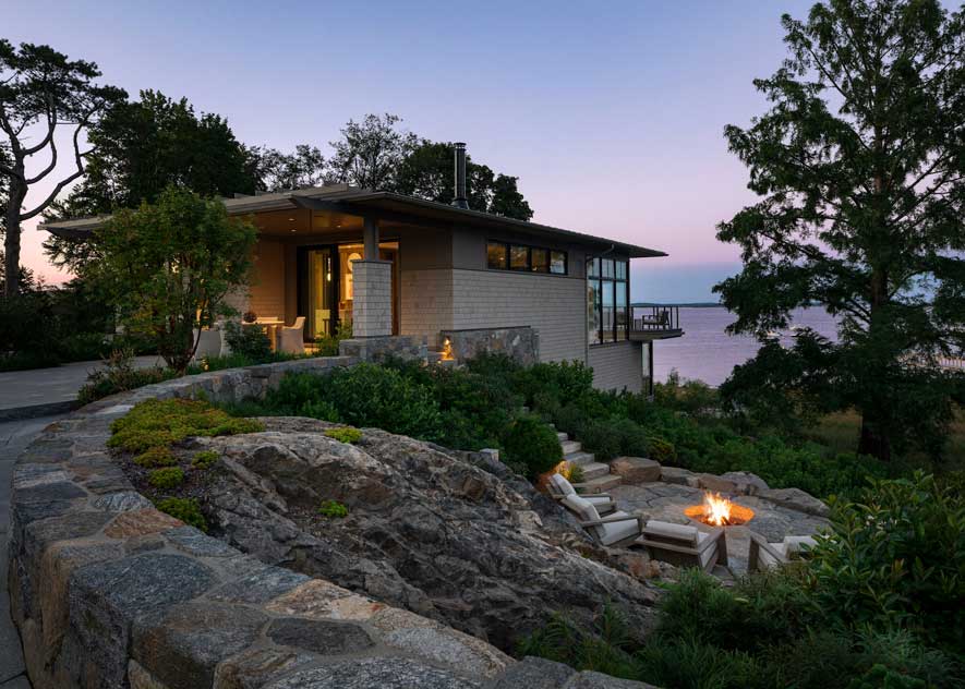 House overlooking the water at dusk