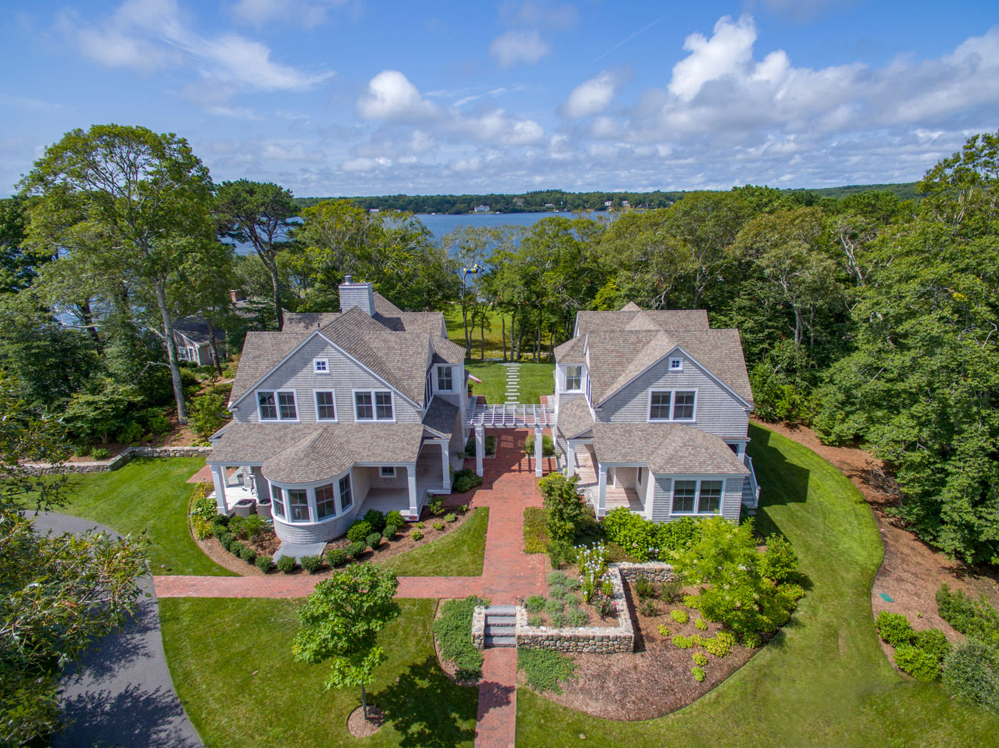 Twin cottages give two couples privacy on Cape Cod, designed by Paul Weber Architecture, built by Rogers & Marney Builders, Inc.