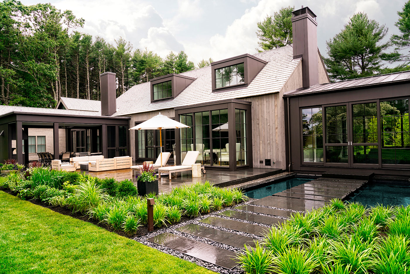 A reflection pool with floating black granite steps by Onyx Corporation