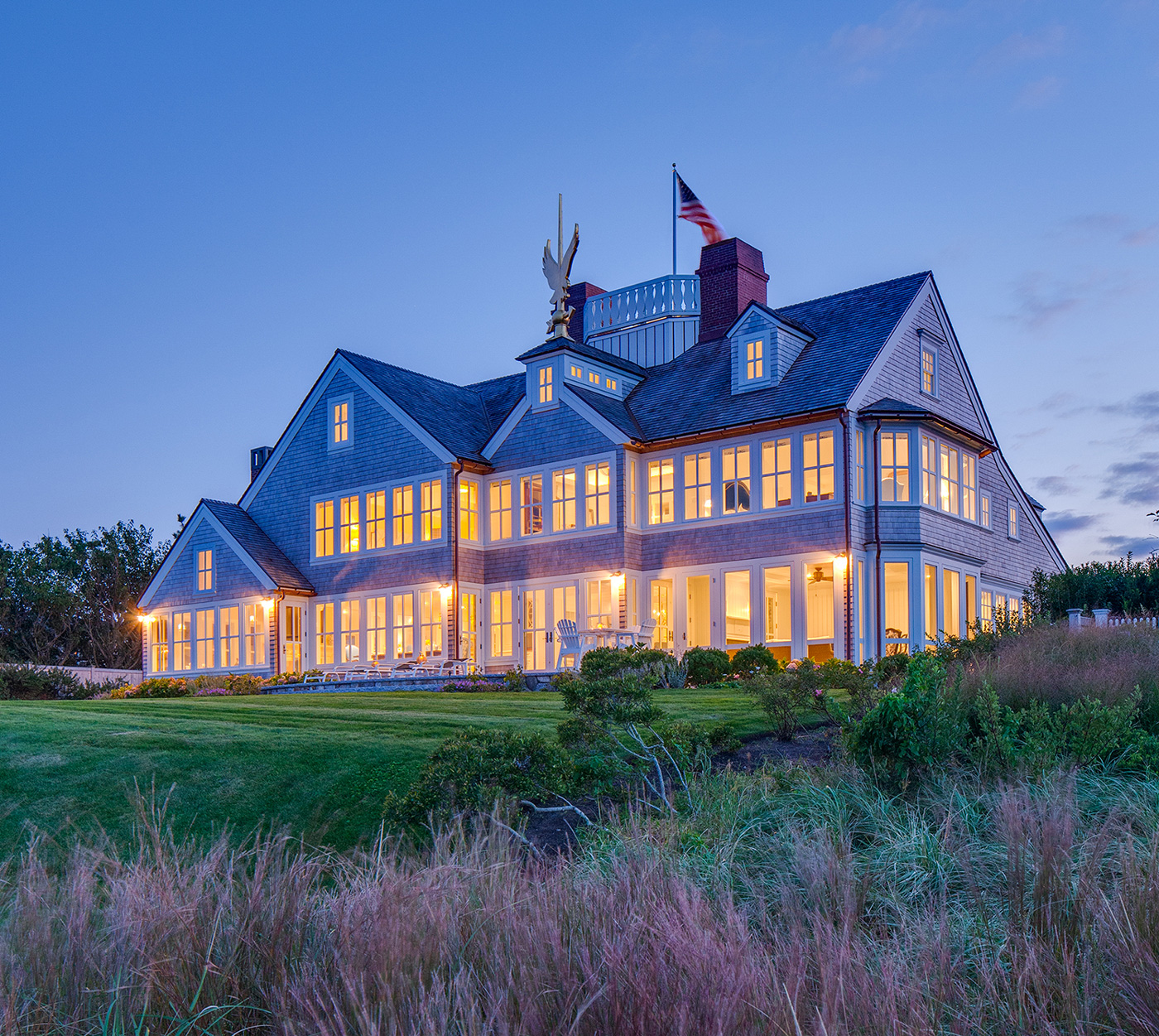 Dusk shot of Cape Cod waterfront home