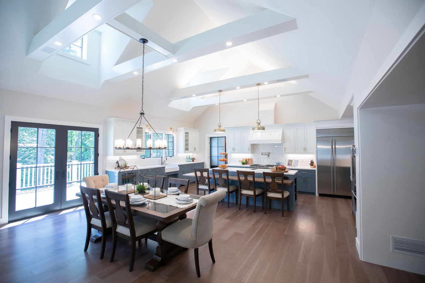 Vaulted living room/dining room and kitchen of a specially adapted smart home, constructed through the R.I.S.E. program at the Gary Sinise Foundation