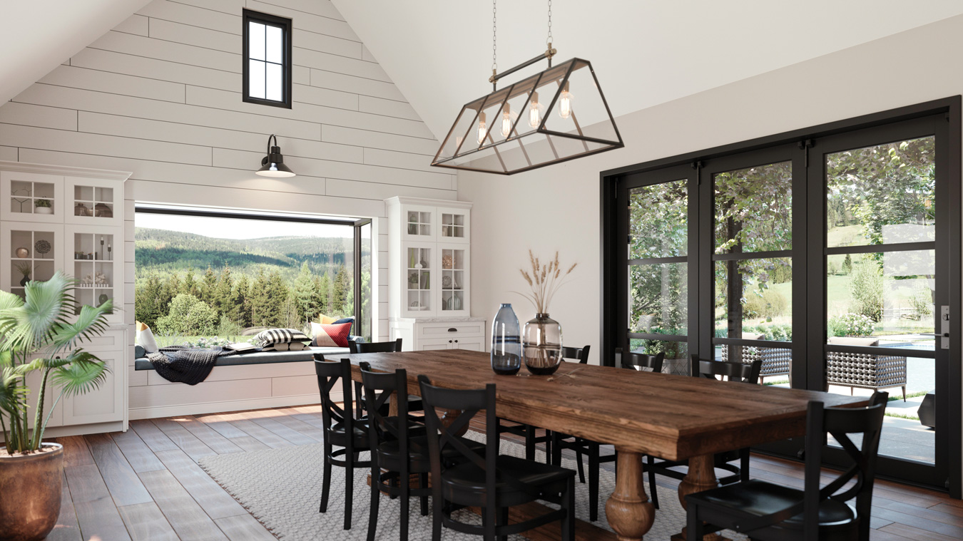 Remodeled dining area with cathedral ceilings big farm table and big scenic windows