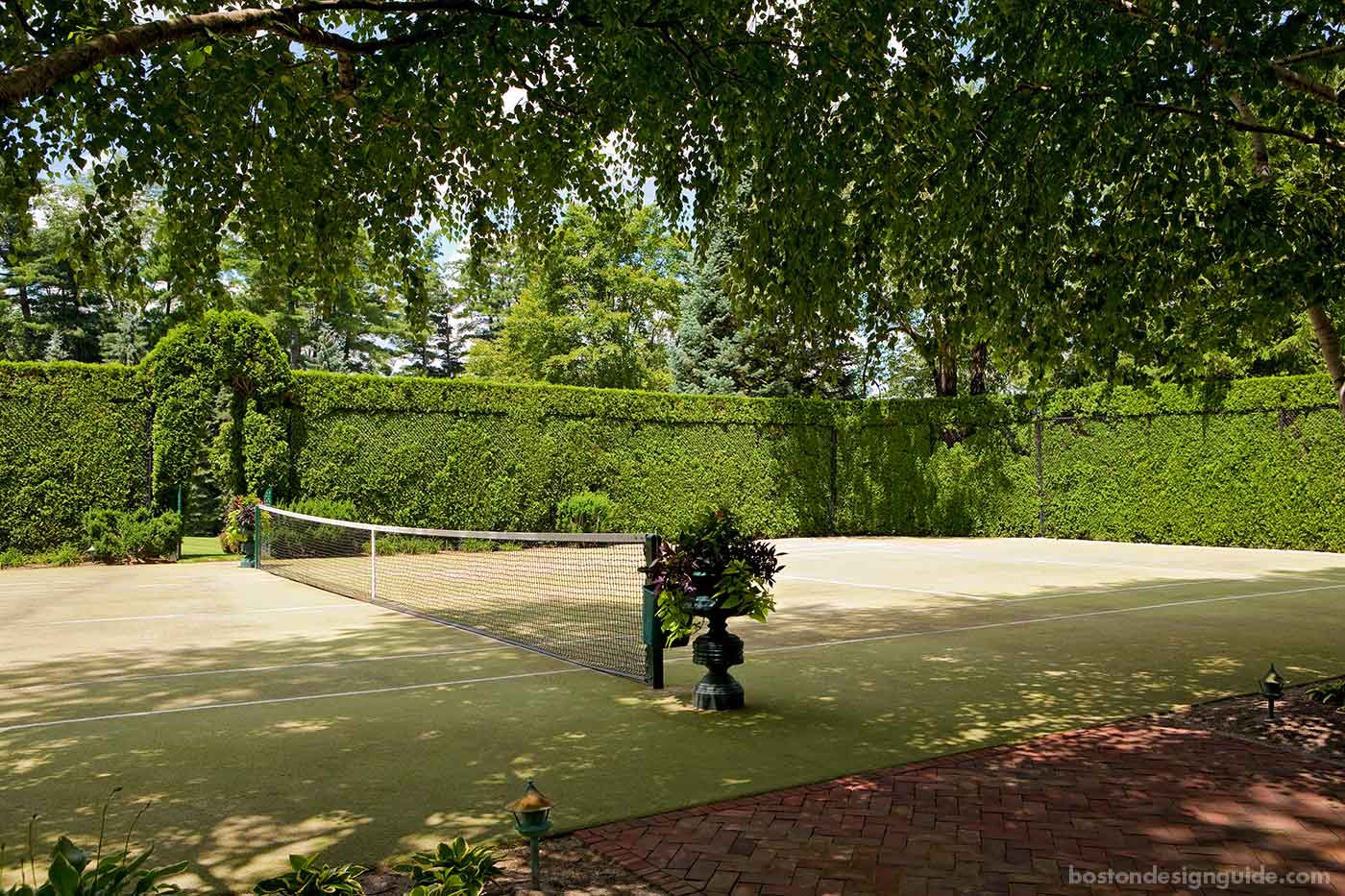 Grass tennis court designed by Sudbury Design Group