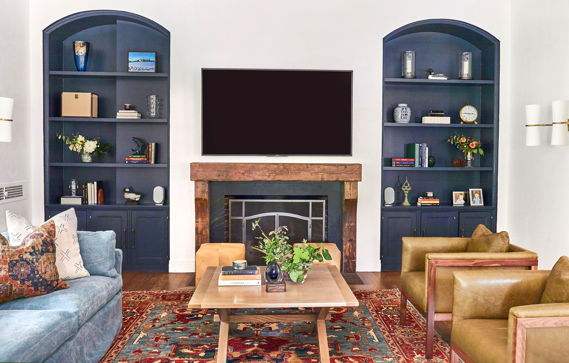 living room with blue bookshelves