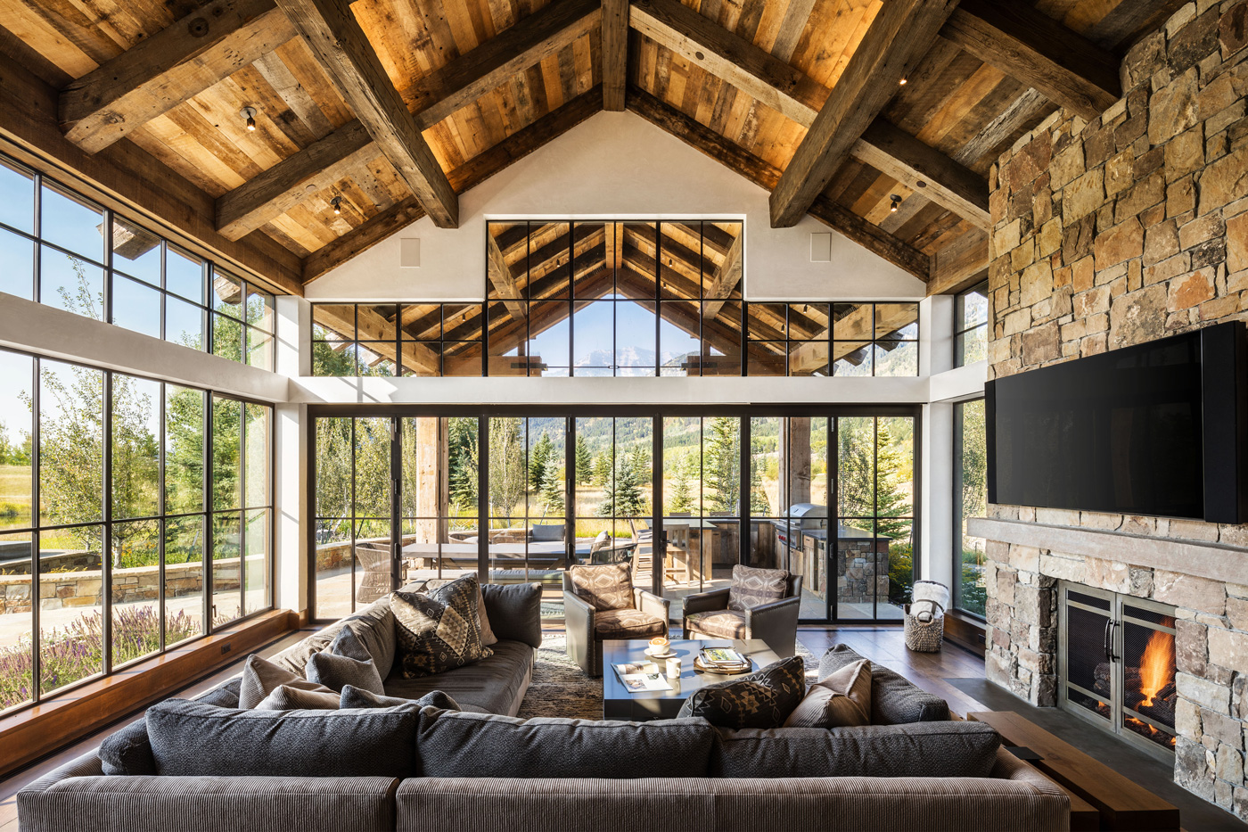 Family room with floor to ceiling windows