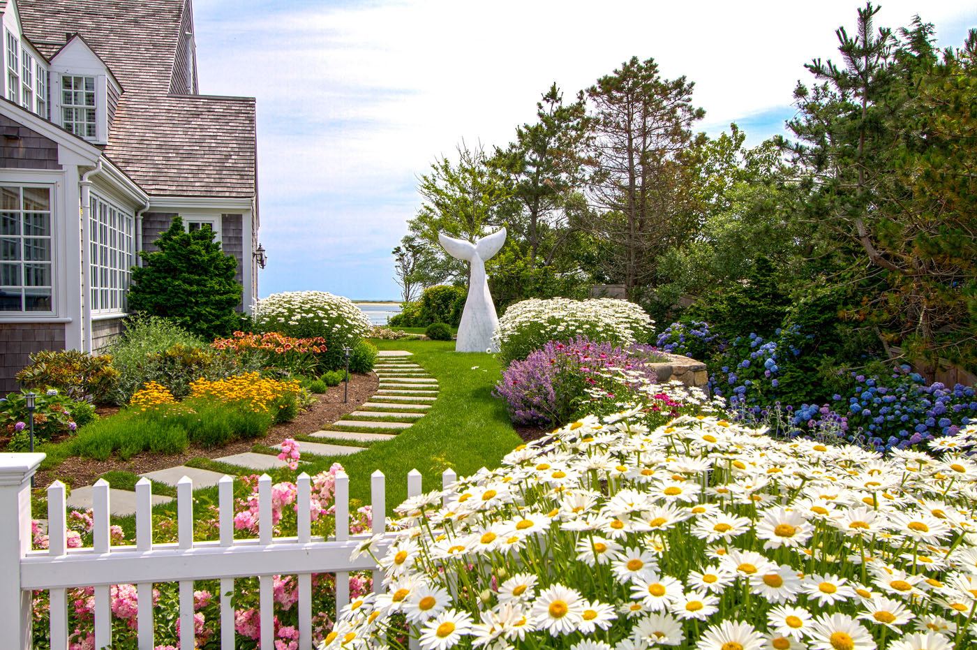 A coastal garden with a touch of whimsy by Schumacher Companies