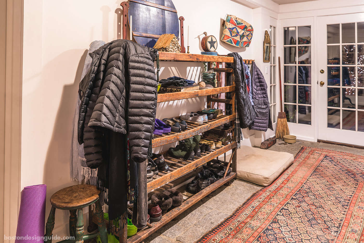 vintage shoe rack in mudroom