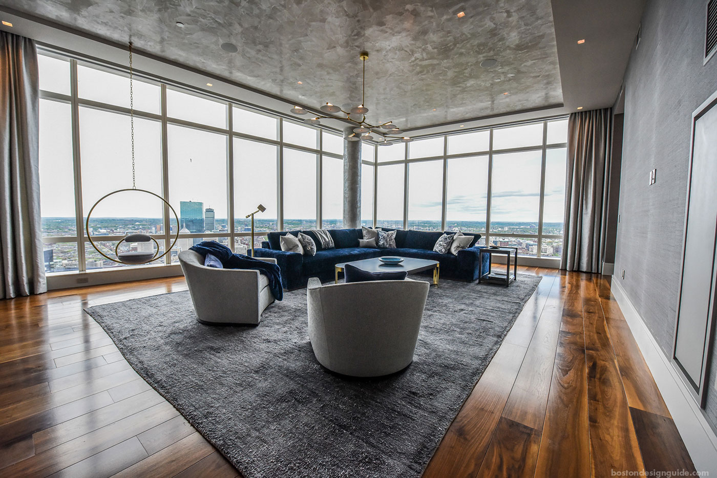 Navy living room set in penthouse apartment