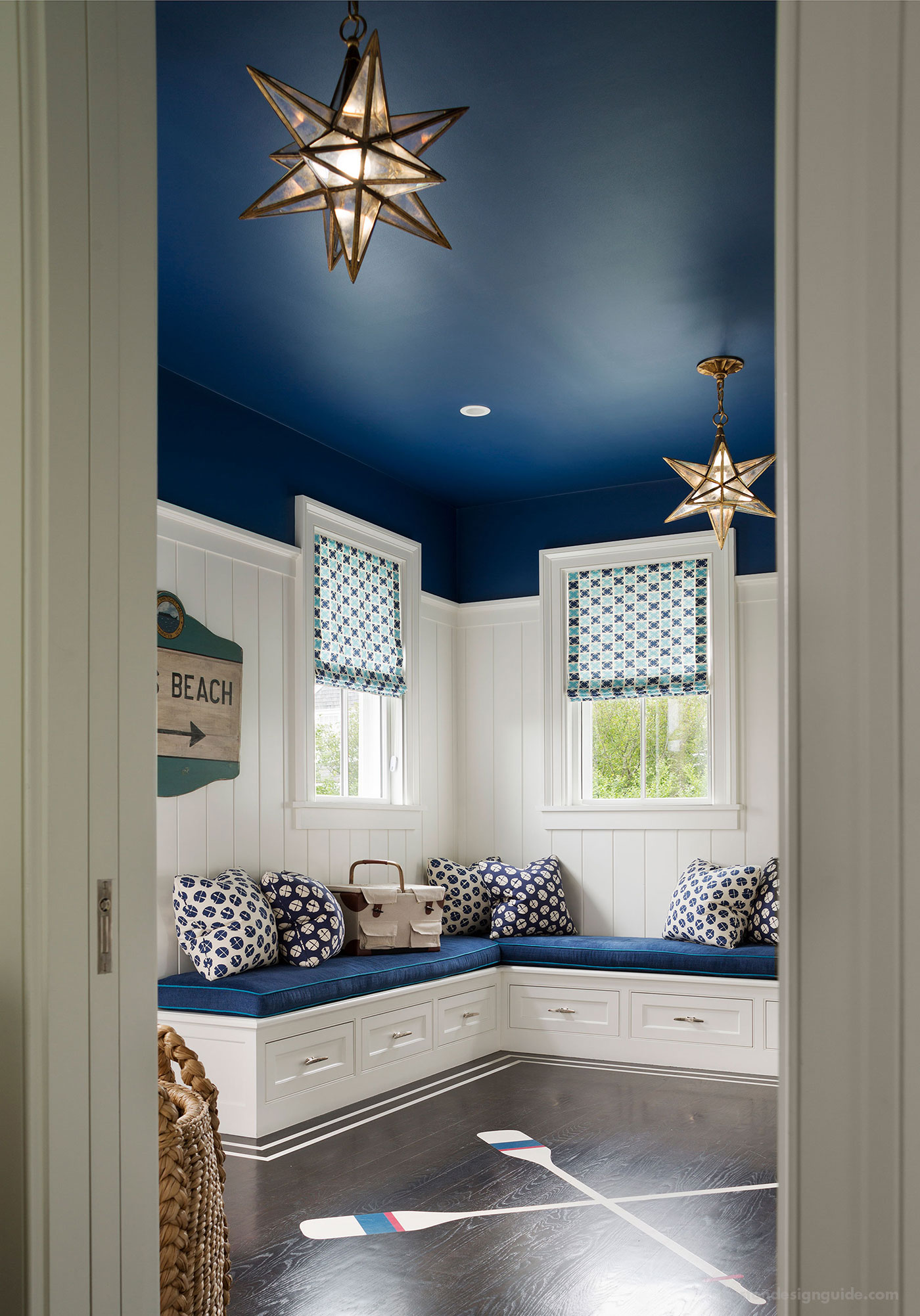 Nautical blue and white entryway designed by SLC Interiors