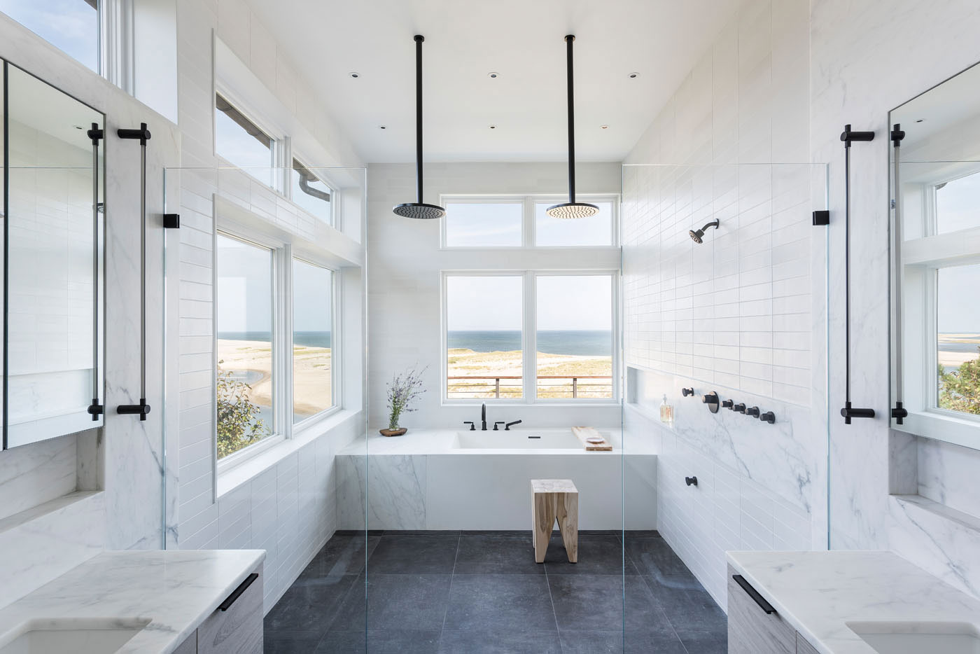 Wetroom bathroom design for a modern oceanfront Cape home built by S.J. Overstreet Construction Co., Inc.