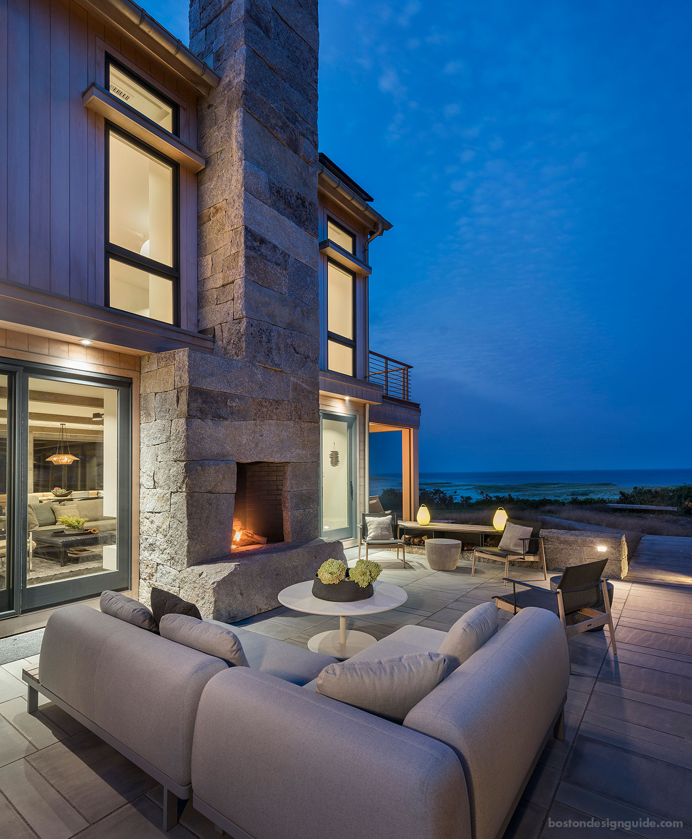 Organic beachside terrace with fireplace, designed by SiteCreative landscape architects