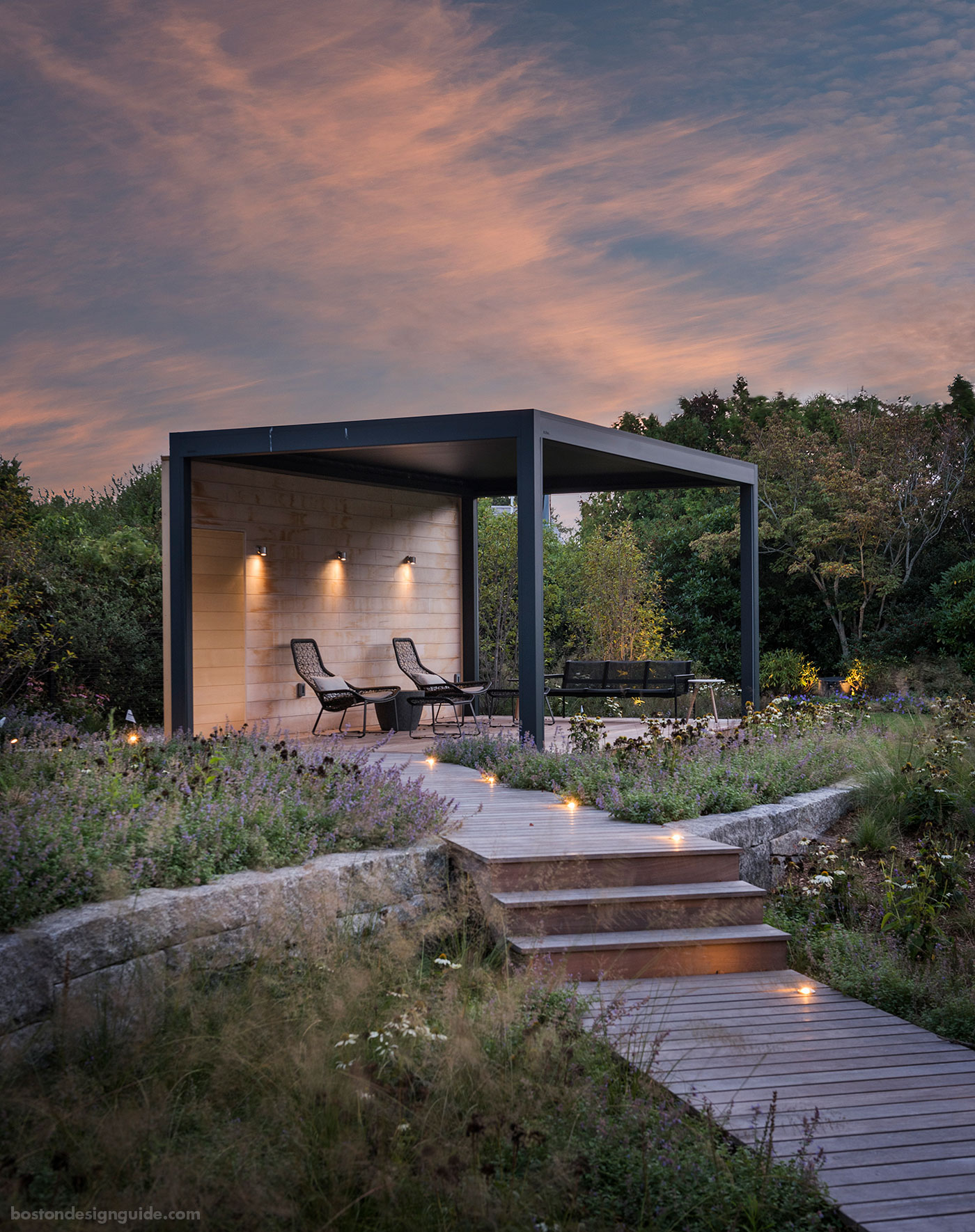 Screened pergola within a coastal meadow designed by SiteCreative landscape architecture and constructed by Schumacher Companies