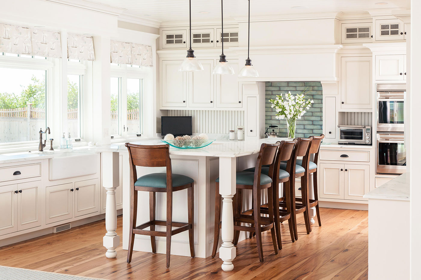 Custom coastal kitchen design by Surroundings Custom Interiors