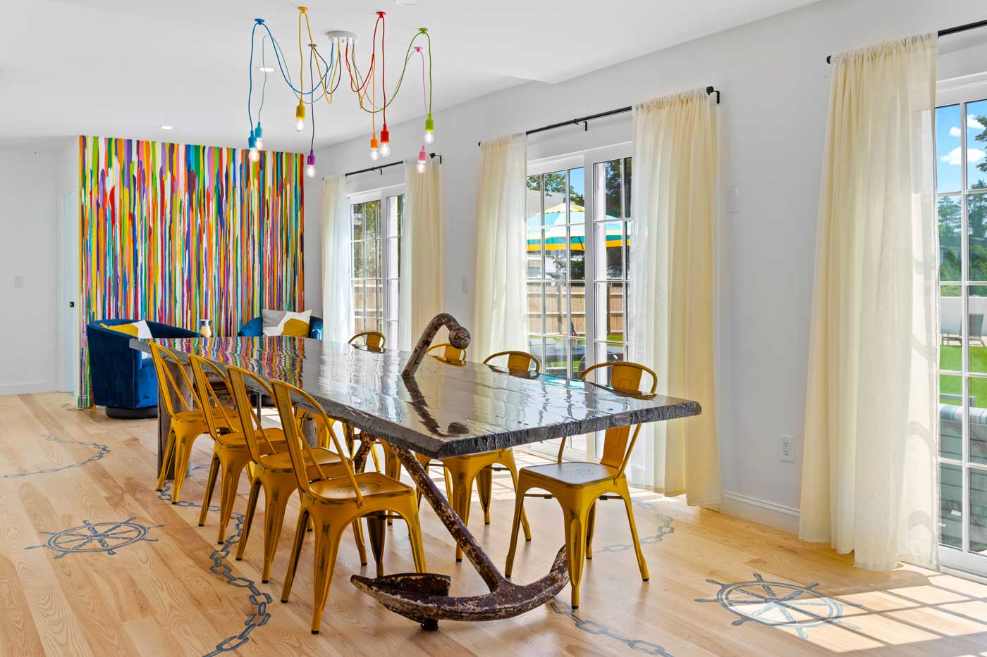 dining table with curtains and light fixture