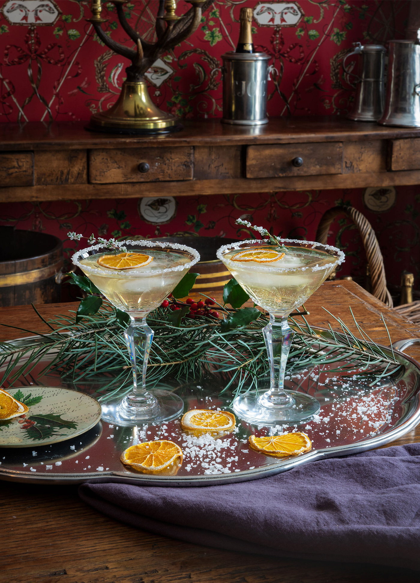 festive holiday drinks on a pewter tray