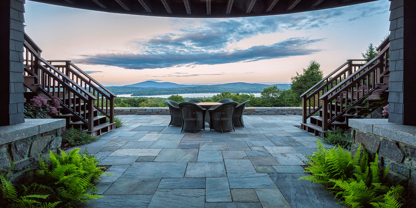 High-end terrace with water view by Pellettieri Associates, Inc.