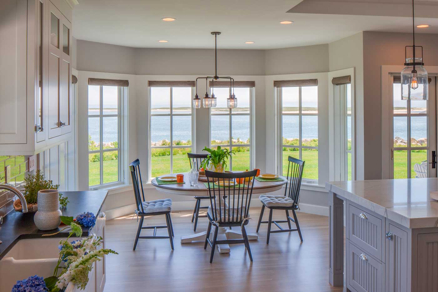 Dining area with big window and view of the ocean