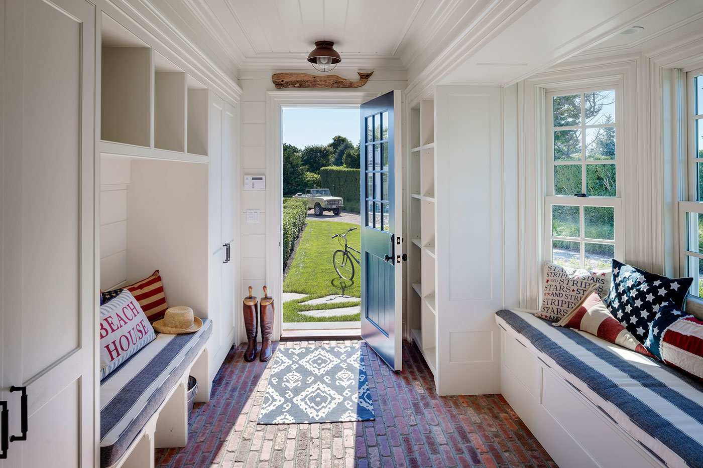 Red, white and blue mudroom and entryway by Patrick Ahearn Architect