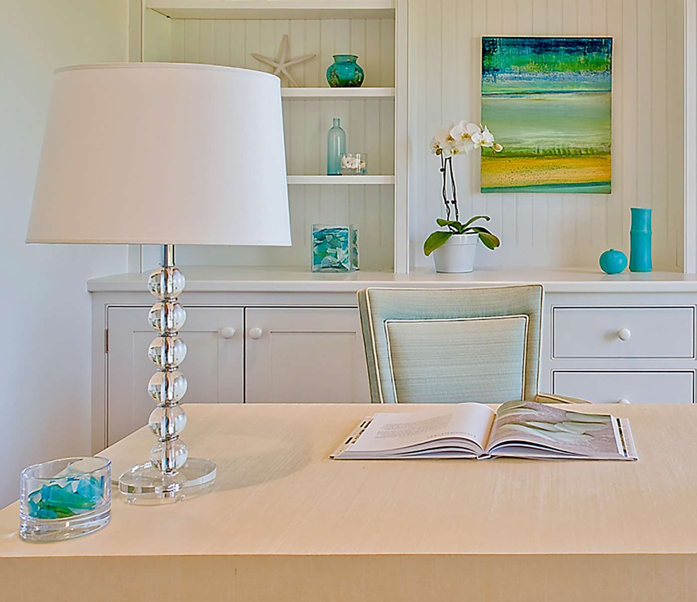 Crisp home office with pops of turquoise by Carter & Company 