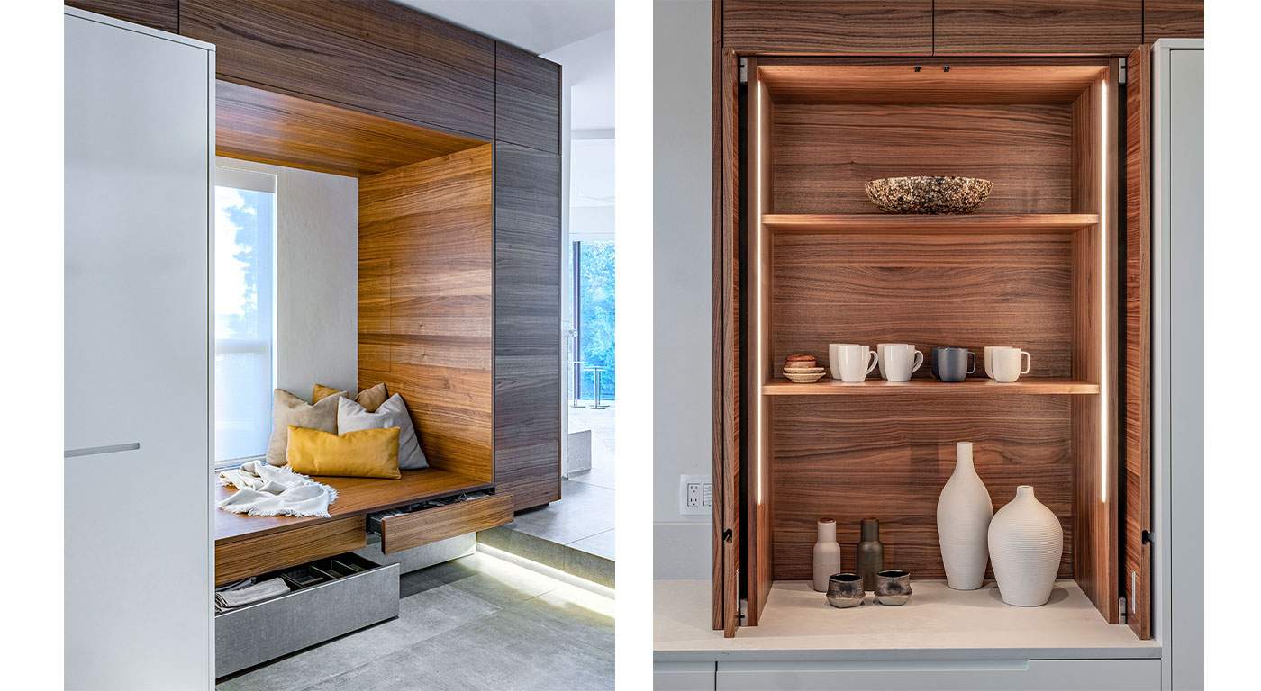 Sleek walnut kitchen cabinetry and nook by Divine Design Center